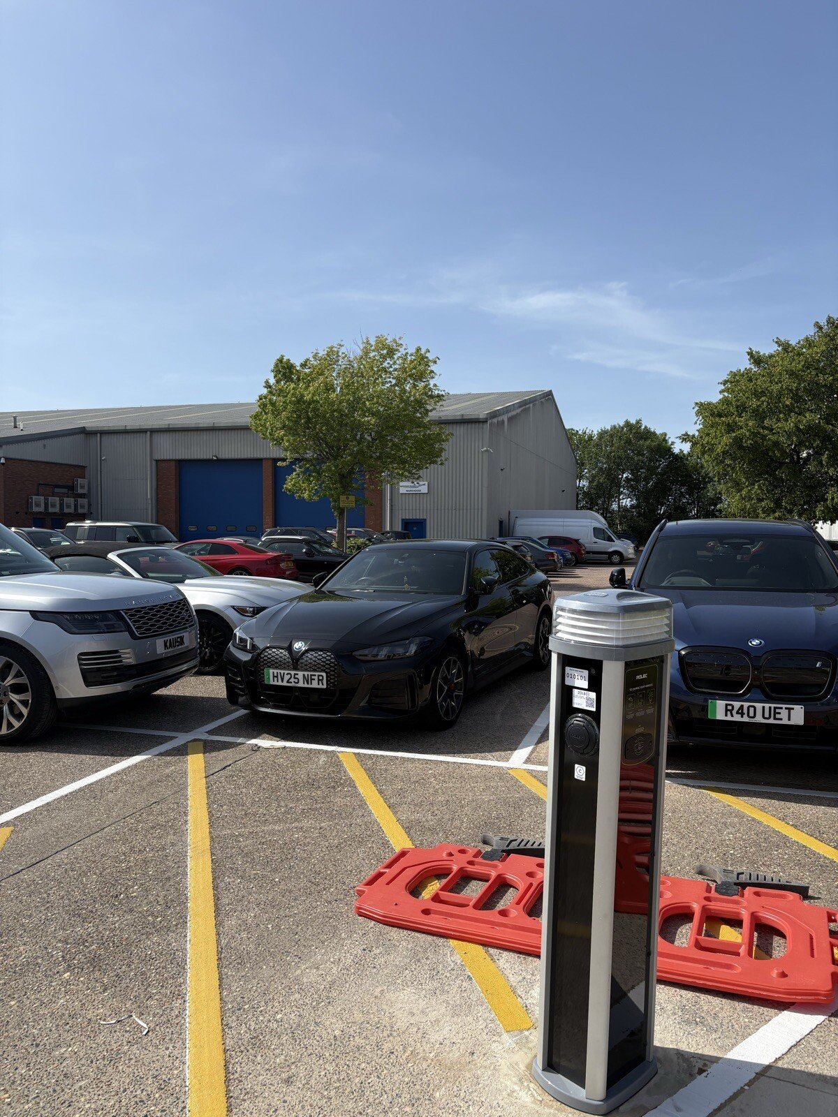 Electric vehicles parked at the new EV charging bays at Encourt Padel, Ventura Park, Radlett